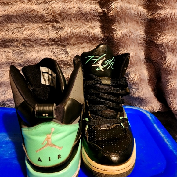 black and teal jordans